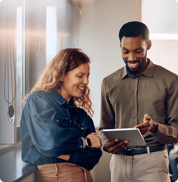 Accessible collaboration between diverse colleagues using a tablet in a modern office environment.